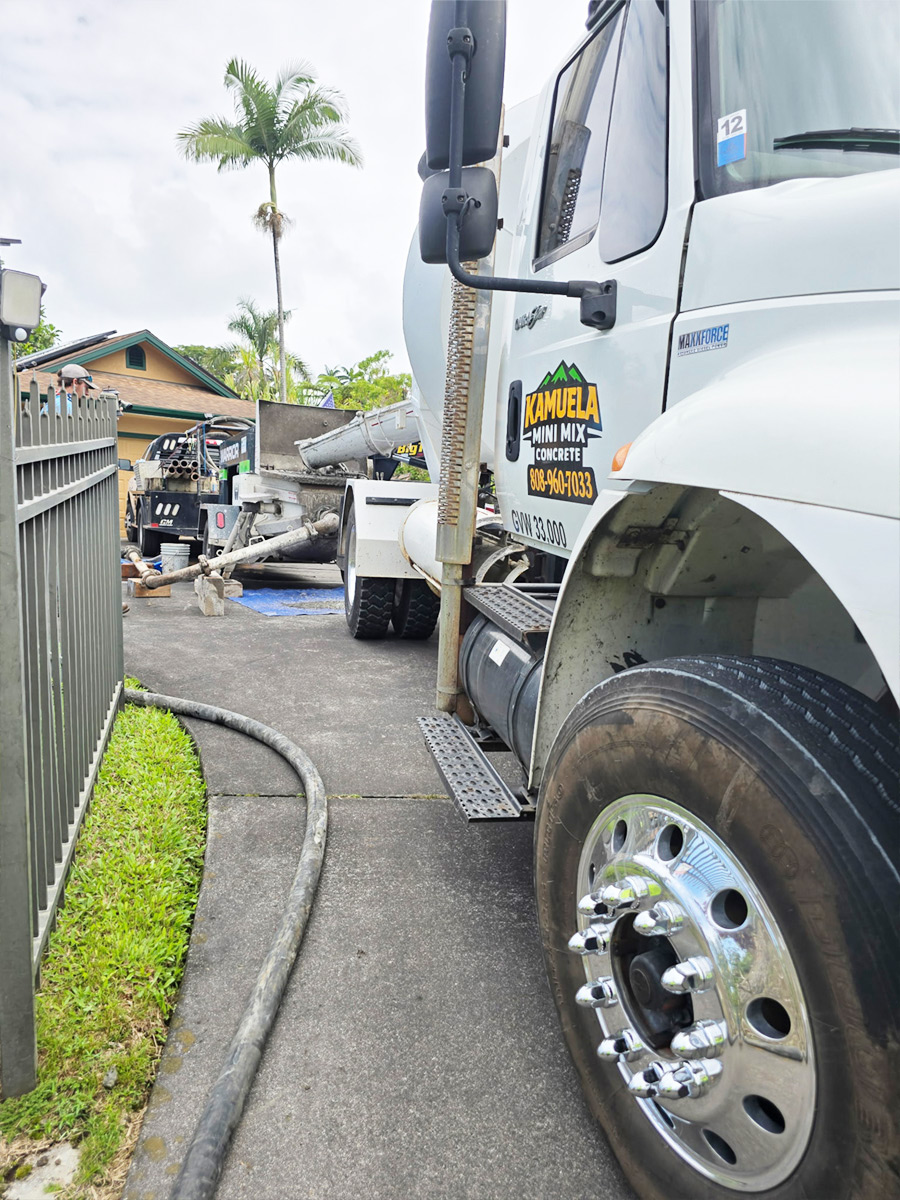 Mini mix truck at a residential delivery