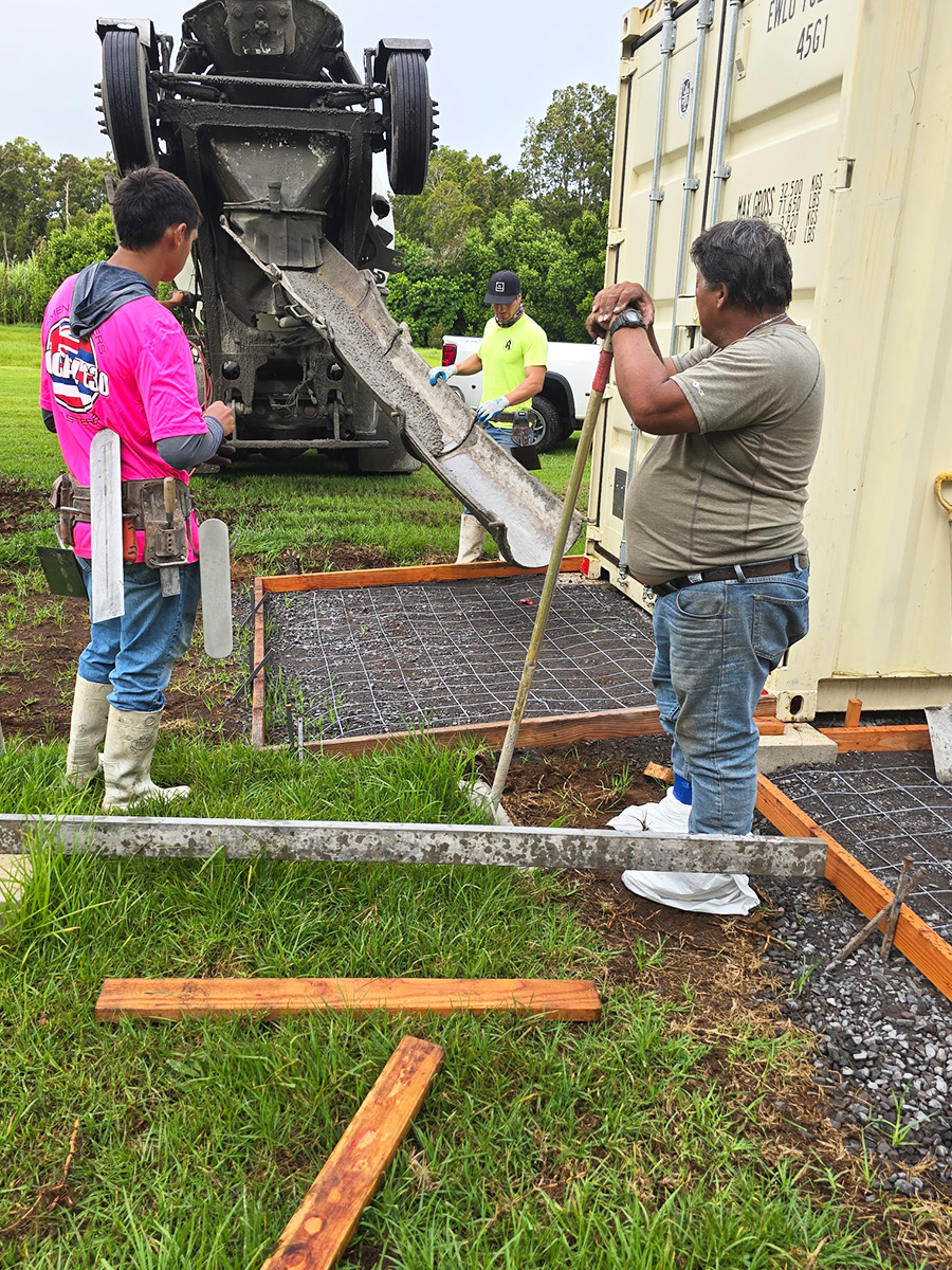Chuting concrete into a formed pad